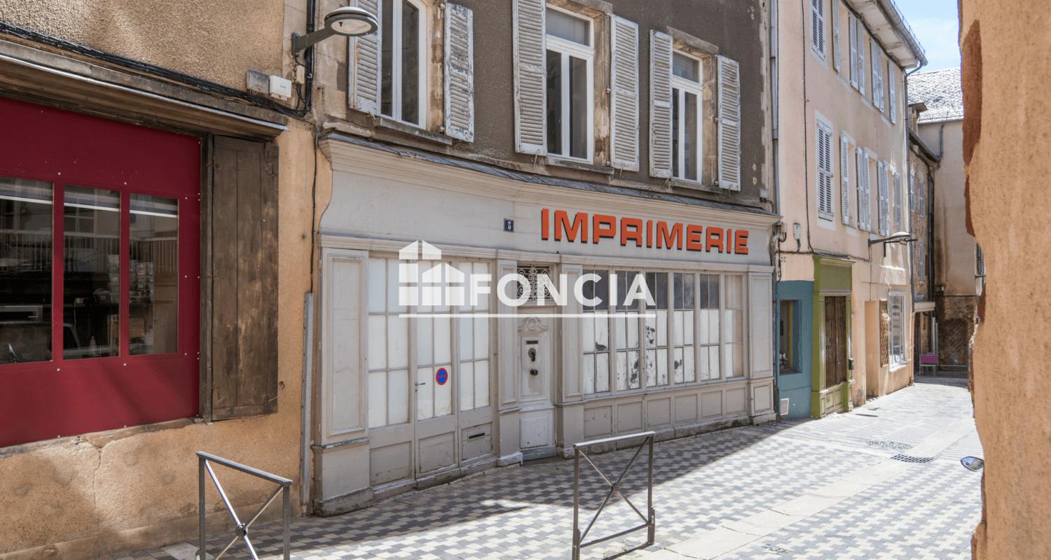 Appartement de caractère de 147 m² avec local professionnel de 89 m², studio indépendant, annexe à rénover, cour privative et combles aménageables en plein cœur de Rodez