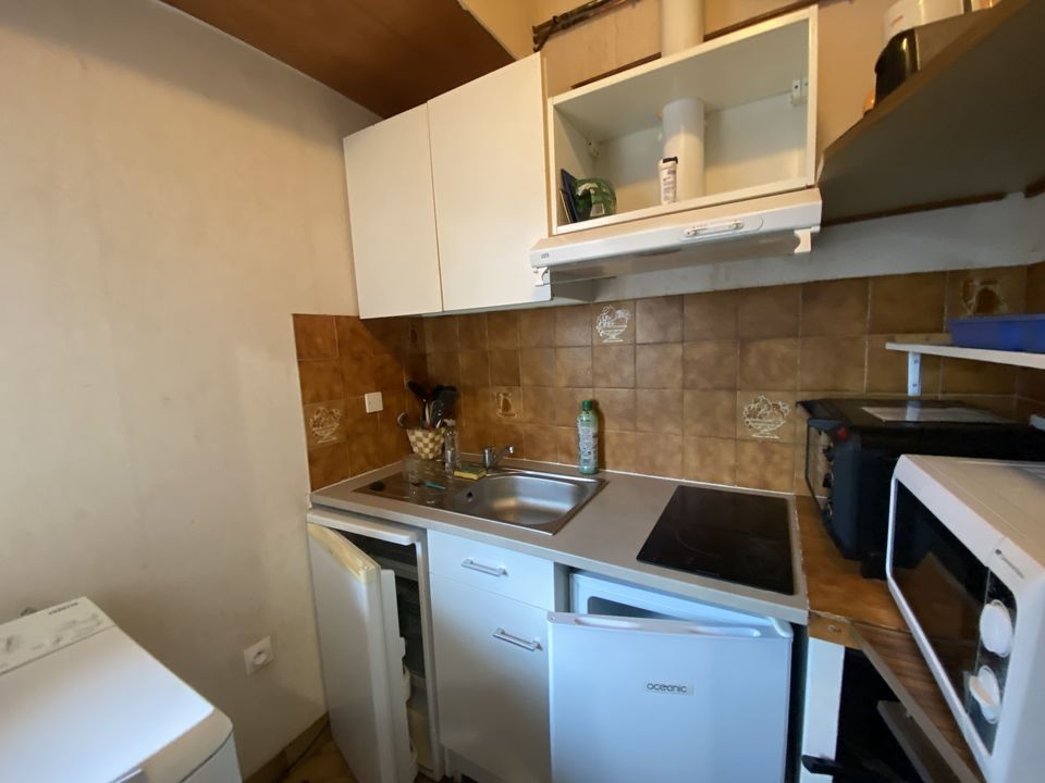 APPARTEMENT AVEC MEZZANINE ET BALCON - Photo 4