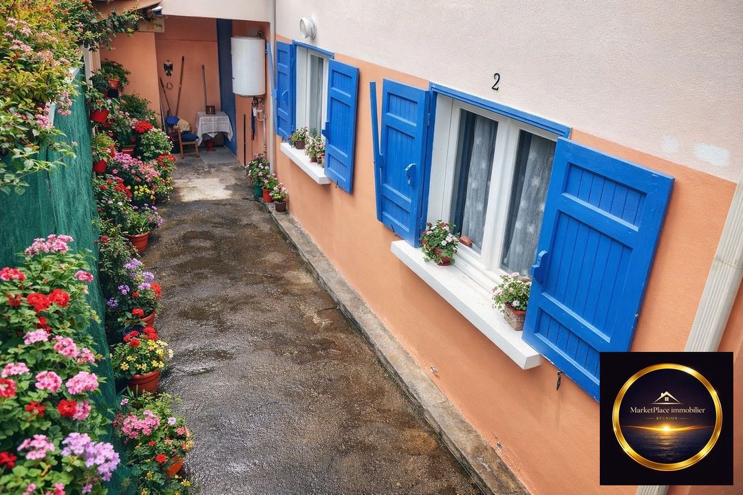 Appartement F4 en rez de chaussée - Photo 2