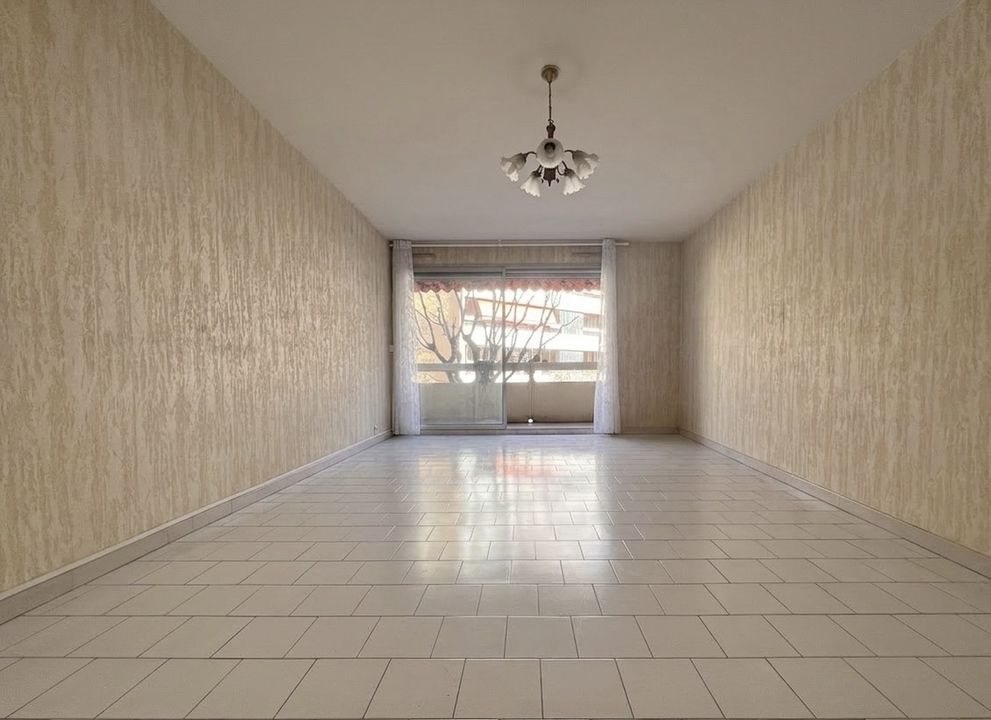 Appartement T4 traversant 83.05m² avec balcon et garage - Photo 2