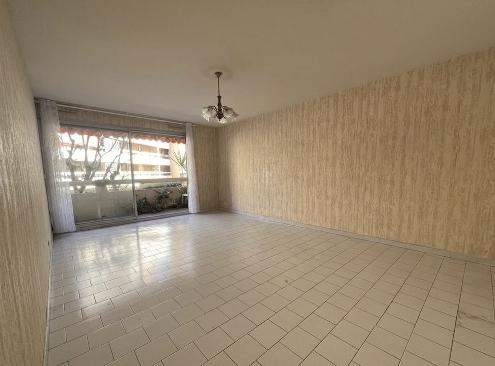 Appartement T4 traversant 83.05m² avec balcon et garage - Photo 3