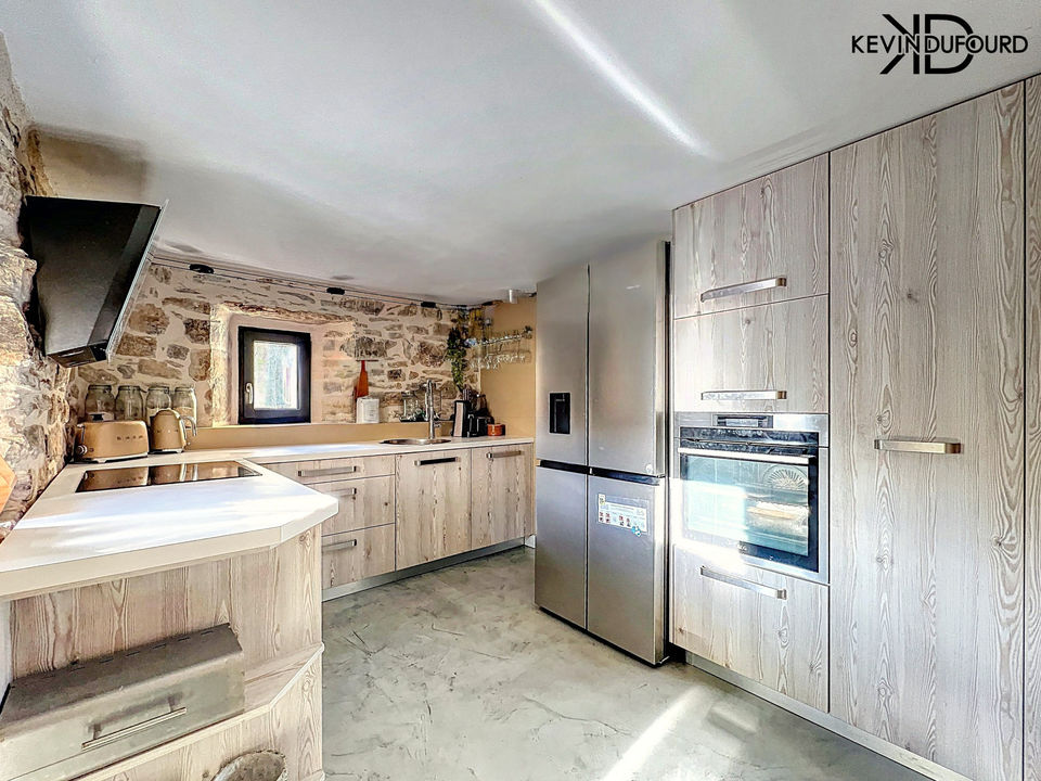 Maison de 100 m² avec un terrain de 340 m² à VESSEAUX - Photo 3
