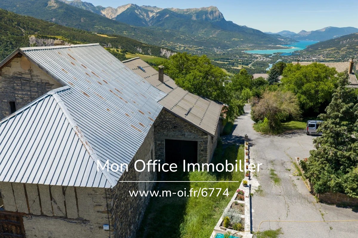 Référence : 6774-MTE - Bâtisse à rénover 150m² - orientée sud- vue Lac