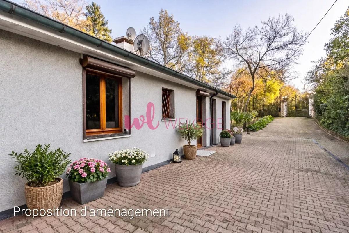 CLAVEISOLLES - PROPIÉTÉ DE 290M² DONT UNE MAISON DE PLAIN-PIED DE 167M² - PARC BOISÉ DE 8 400 M²