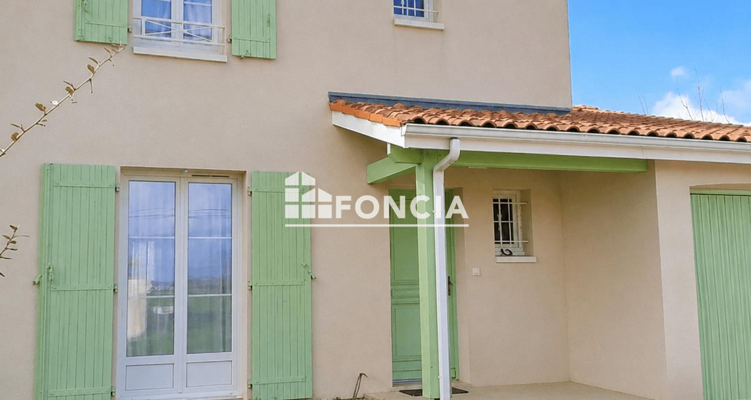Maison familiale avec jardin dans un quartier pavillonnaire