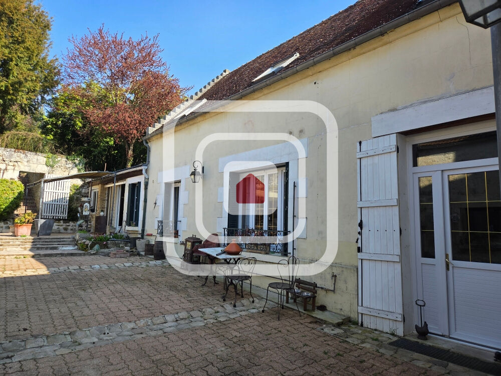 Propriété comprenant 2 maisons