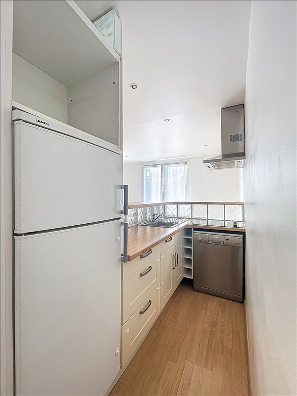 Appartement - 1er étage - 49,99 m2 - 2 pièces - Non meublé - Photo 4