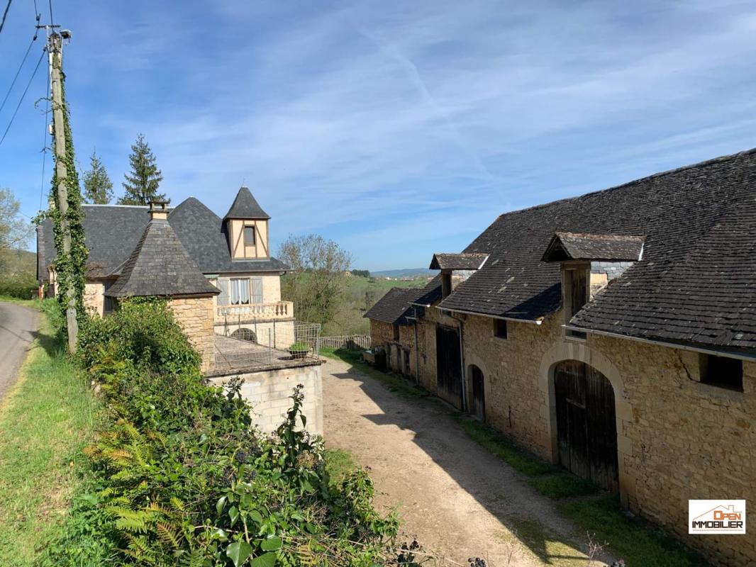 Maison avec grange et terrain