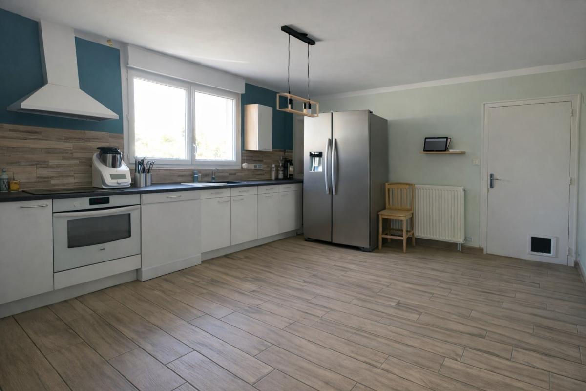 Maison - Photo 2