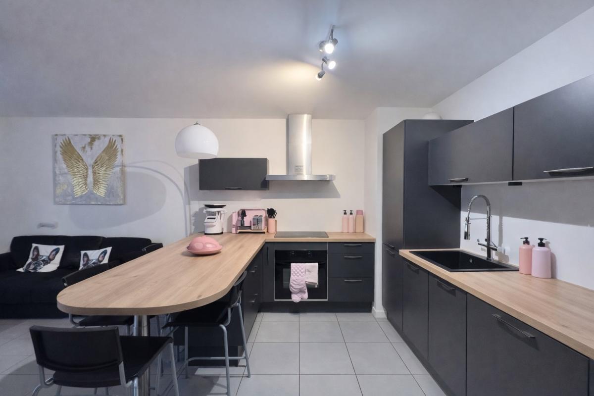 Appartement en rez-de-jardin - Photo 2