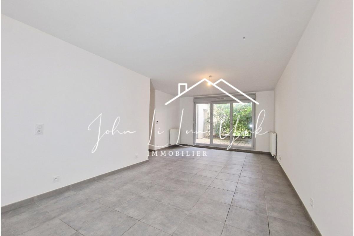 Appartement en rez-de-jardin - Photo 2