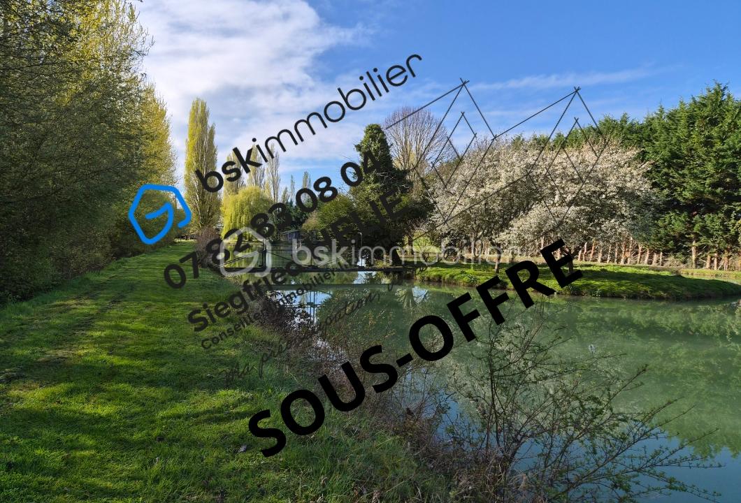 Terrain de loisirs 11 000 m² – étang 6 000 m²