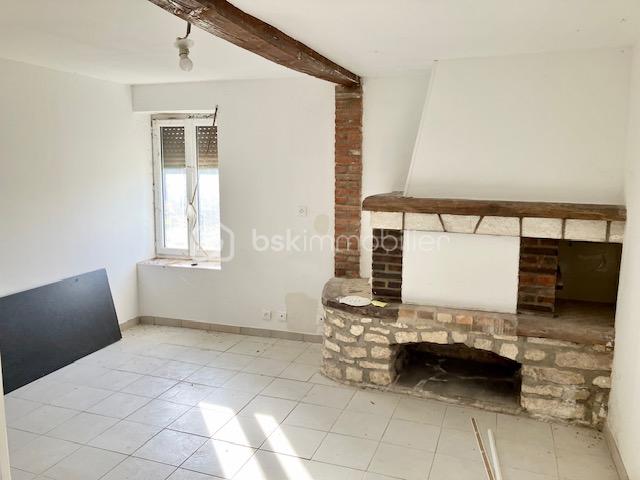 Maison dans village calme