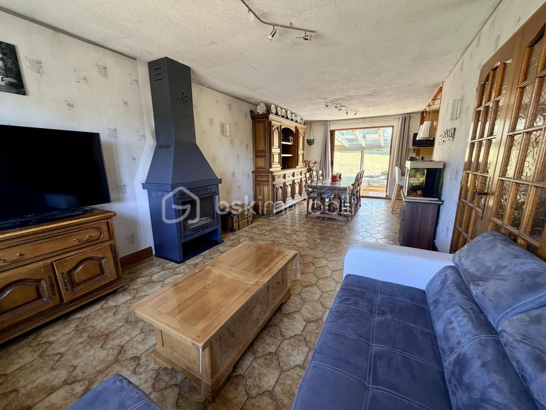 Maison 5 pièces avec véranda, sous-sol complet, grand garage et jardin
