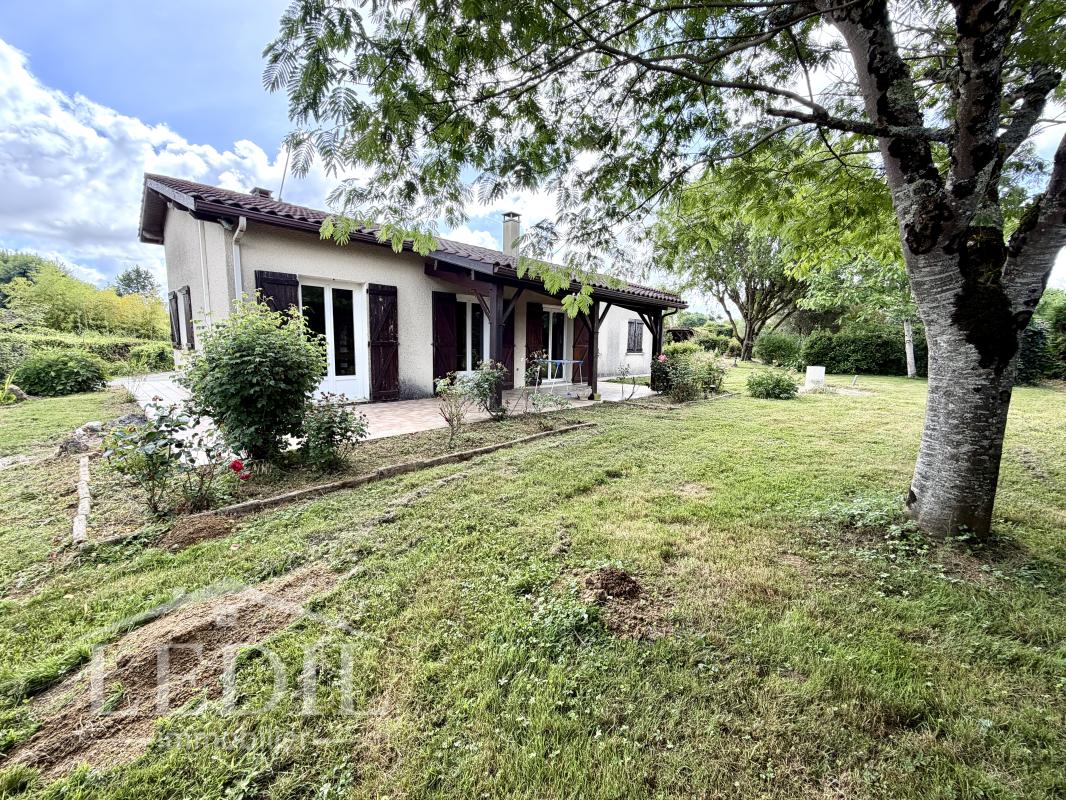 Plain pied avec garage et terrain