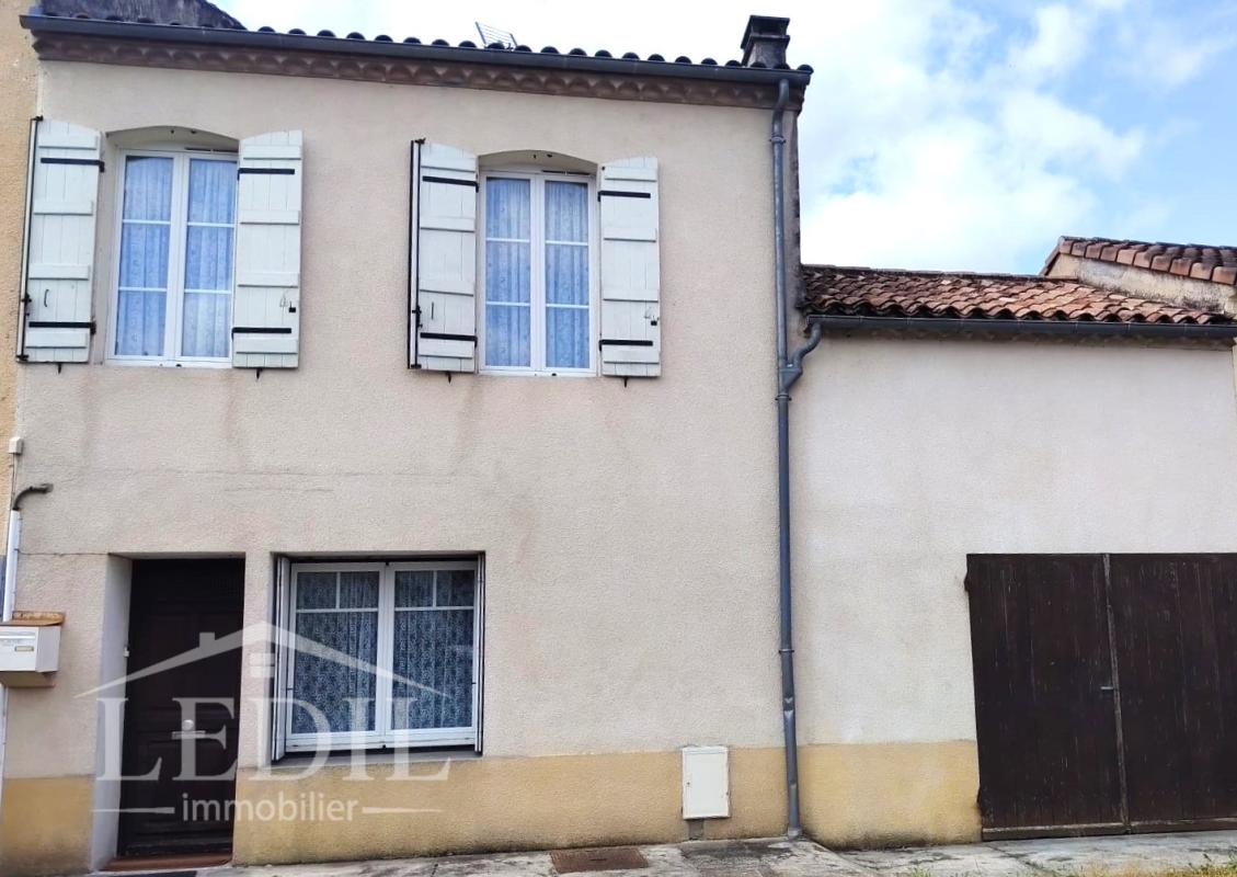 A Mézin, maison avec garage et jardin