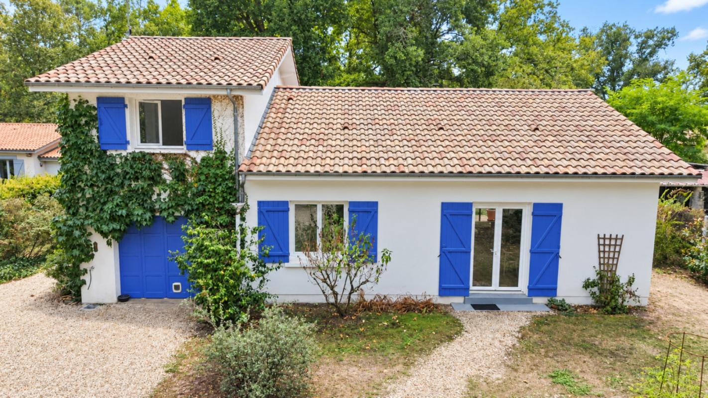 Maison familiale avec jardin arboré