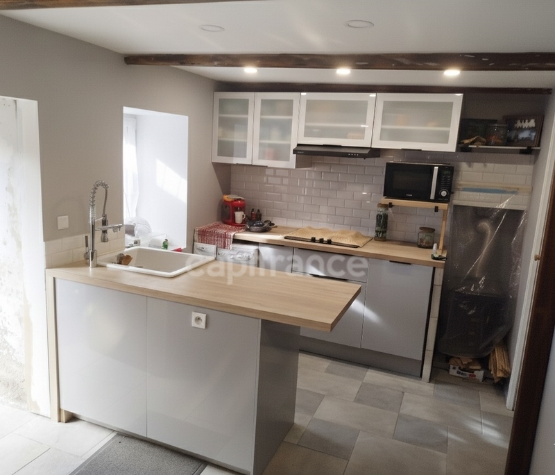 Maison en pierres 3 pièces entre Carhaix et Rostrenen plain pied 92 m2 dont combles aménageables