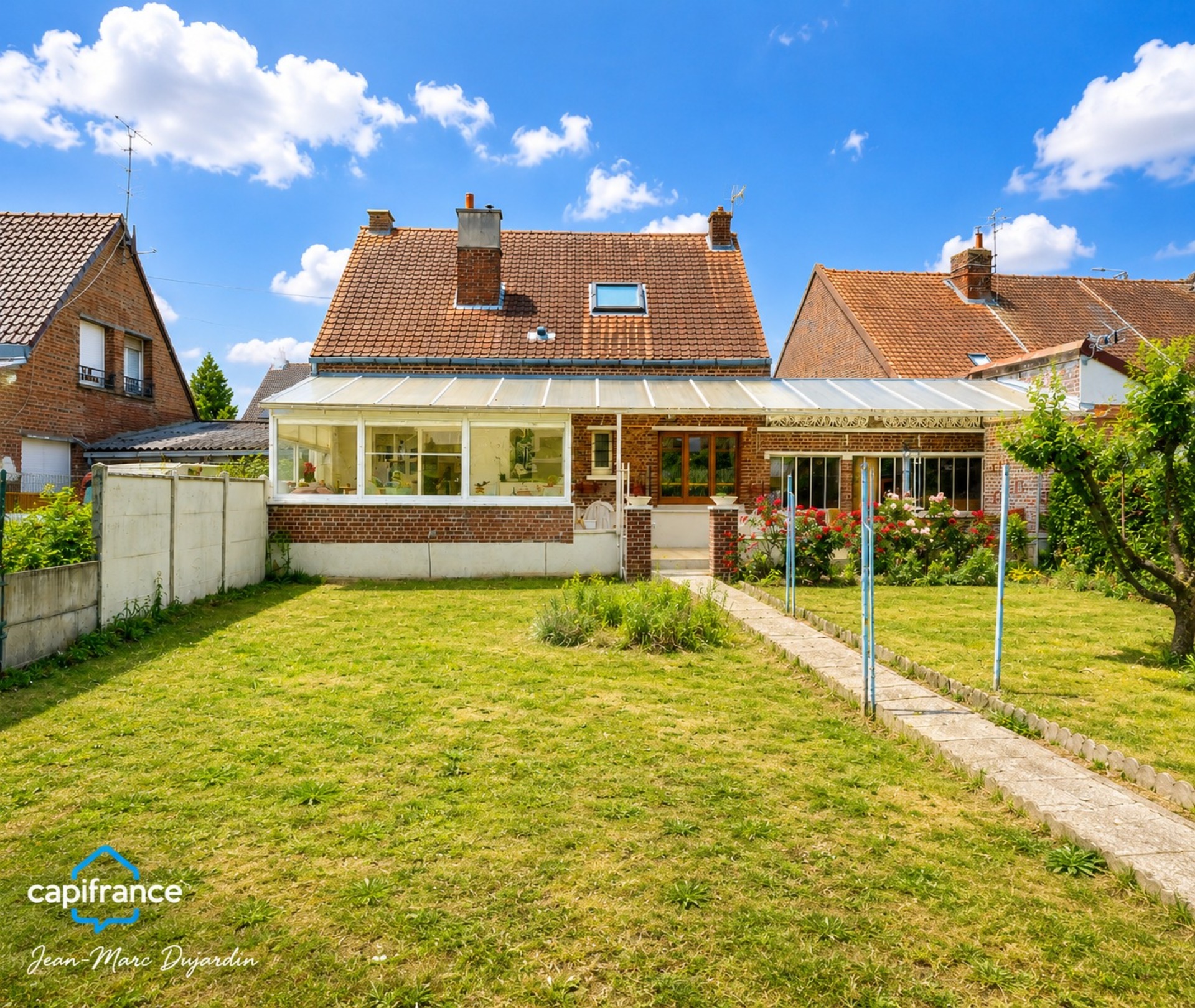 Maison 105 m², 4 chambres, jardin et grand garage à Fenain
