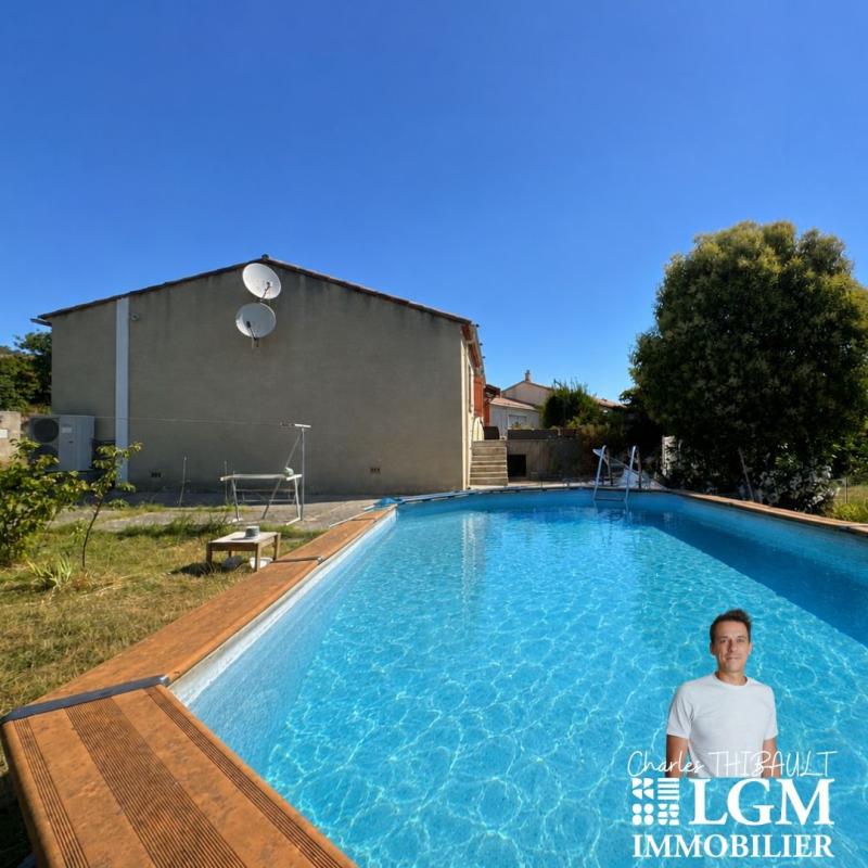 Maison familiale avec grand terrain, piscine et potentiel