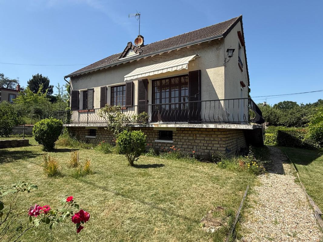 Maison sur sous sol avec jardin