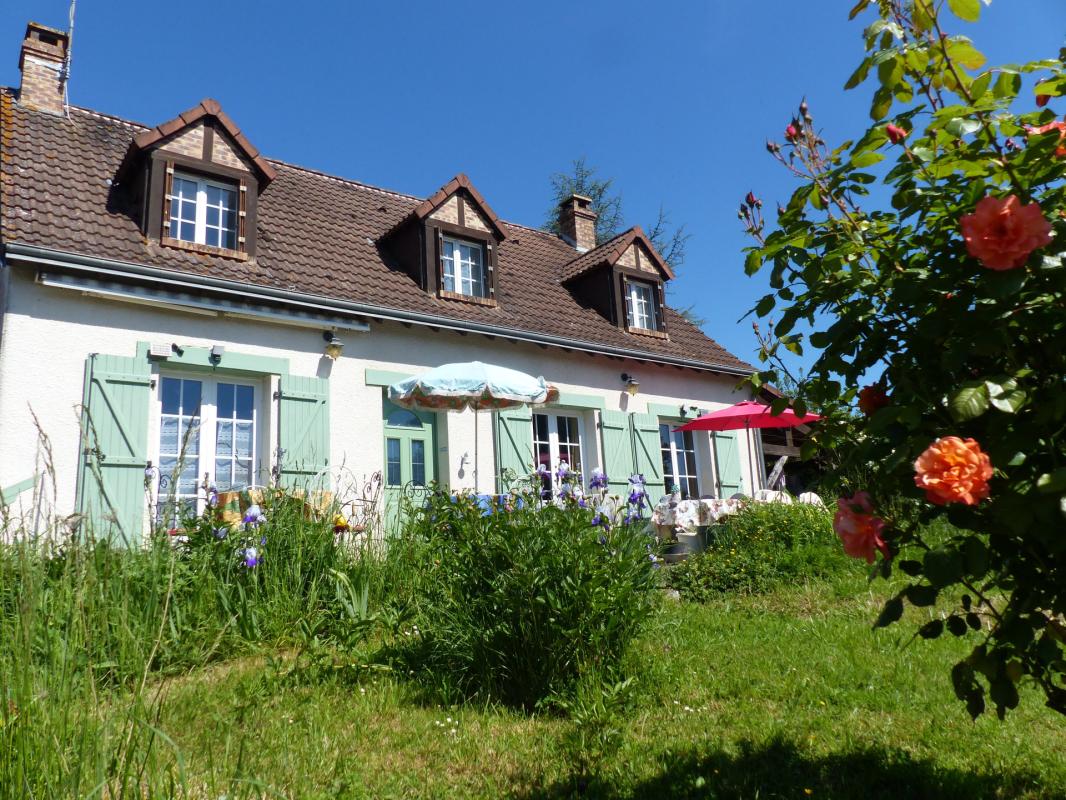 Maison sur sous sol avec jardin