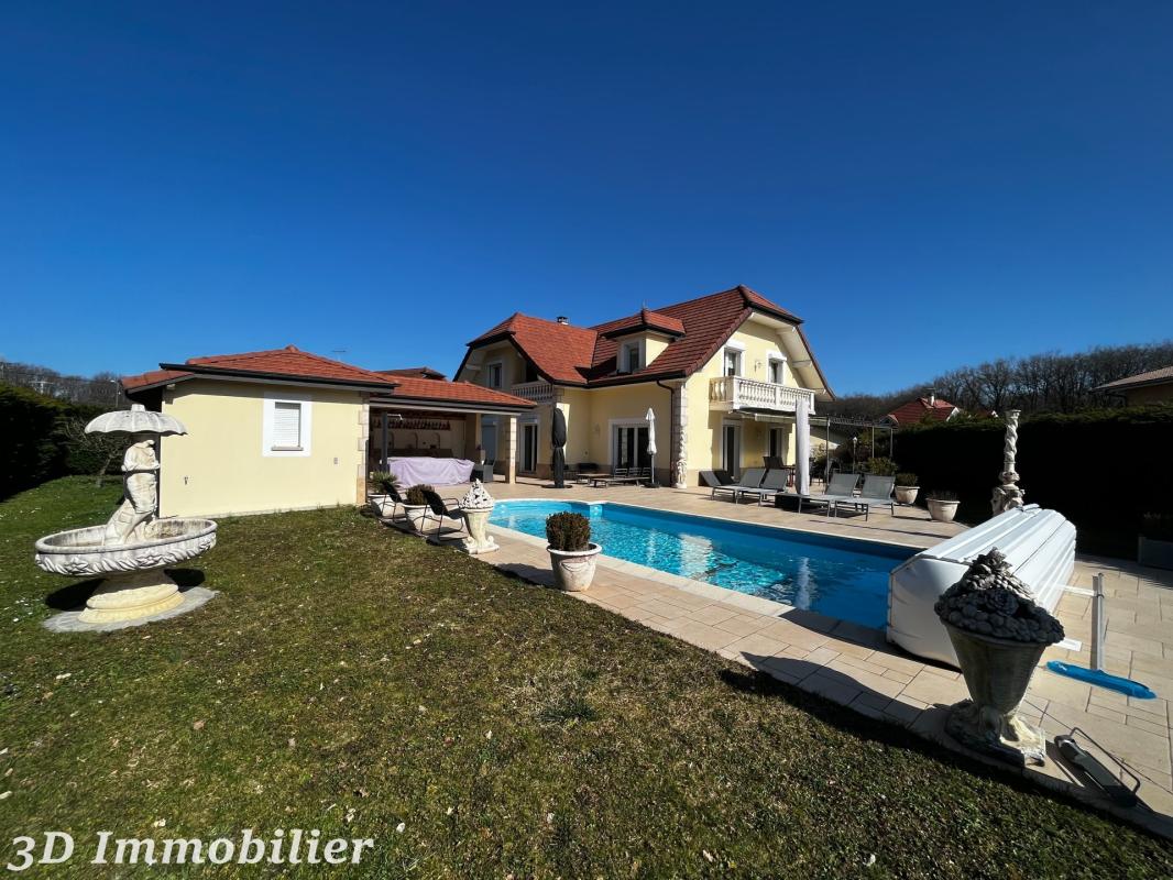Secteur Veigy-Foncenex (74140), situé à deux minutes de la frontière, venez découvrir cette très belle maison d’architecte de 10 pièces d’une surface habitable de 210 m2 avec piscine, sauna et pool-house, grande terrasse avec cuisine d’été - Photo 3