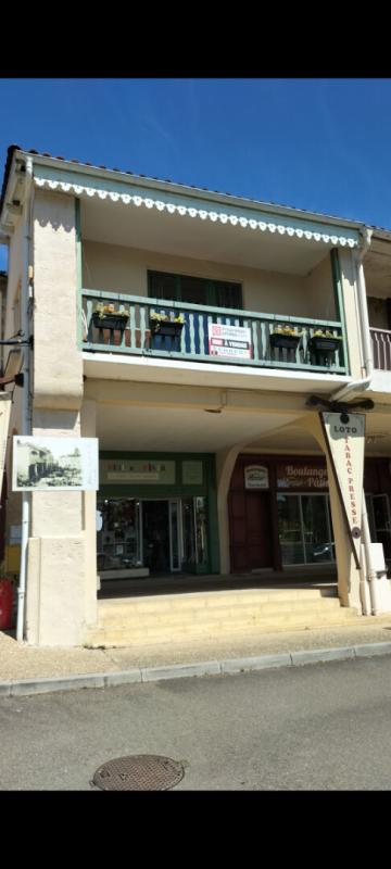 Immeuble comprenant un appartement et un local commercial au rdc
