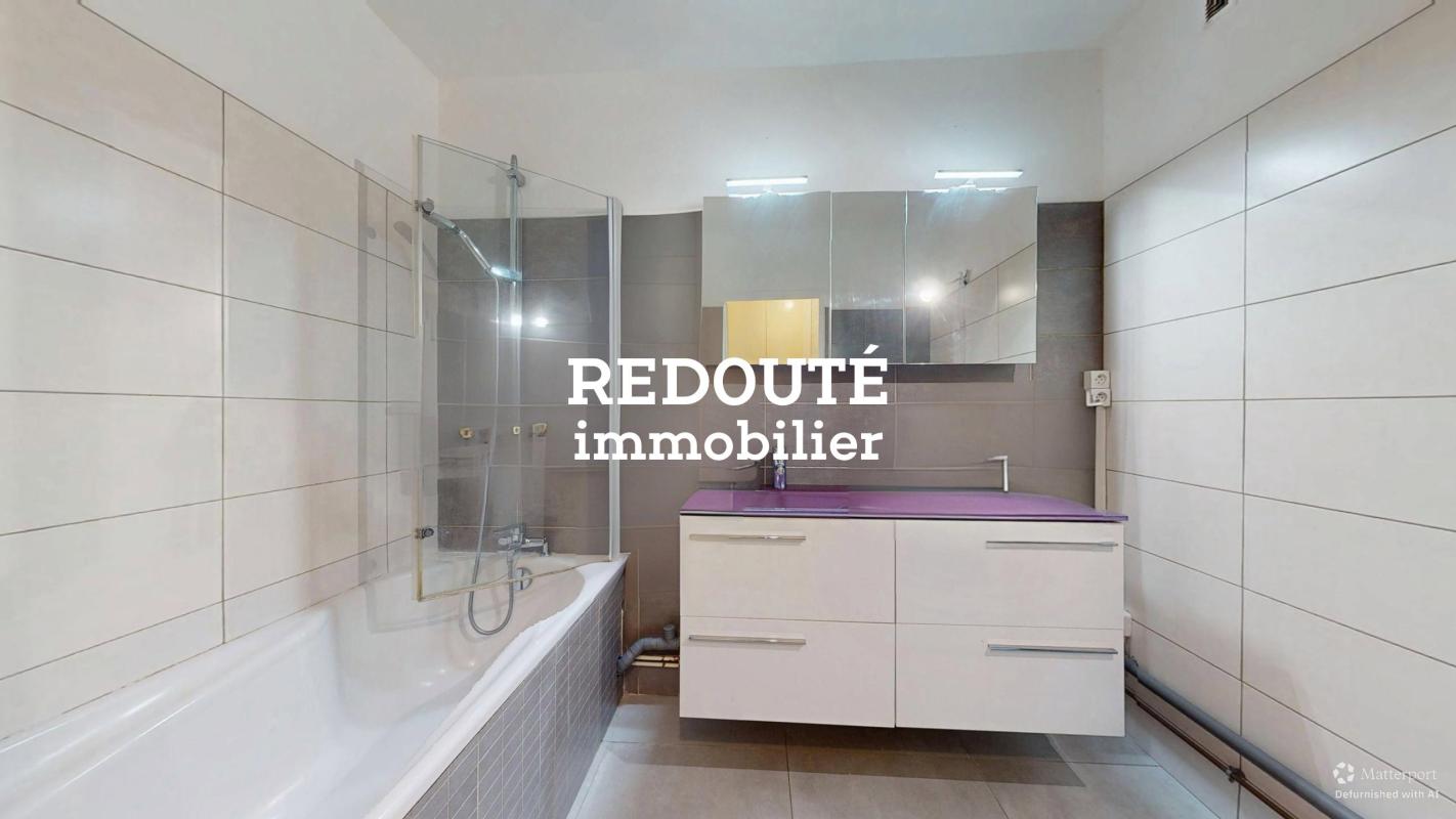 A VENDRE APPARTEMENT T4 A TINQUEUX - BALCON PLACE DE PARKING