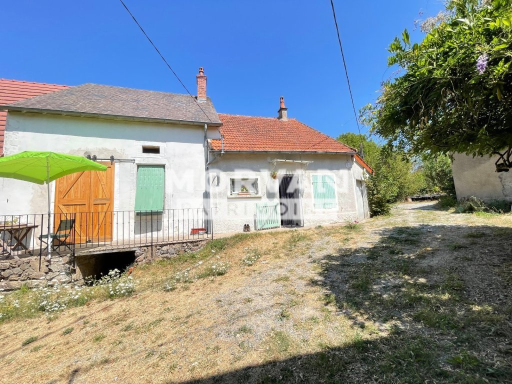 ONLAY — Maison de plain-pied avec garage et jardin