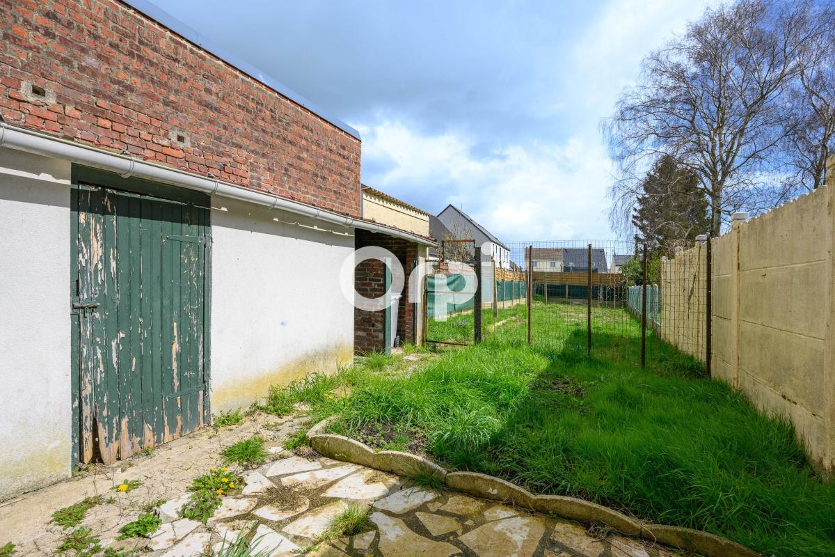 Maison à rénover avec jardin à vendre située à Râches à 5 minutes de Douai