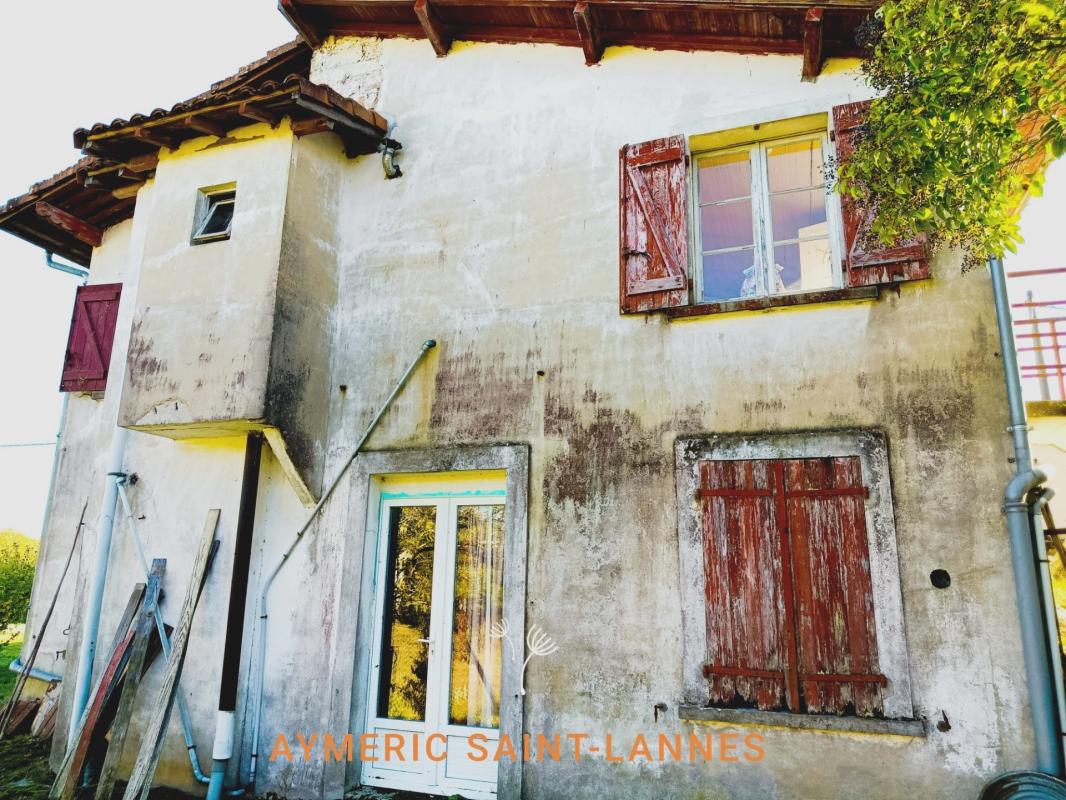 Grande maison avec trois logements