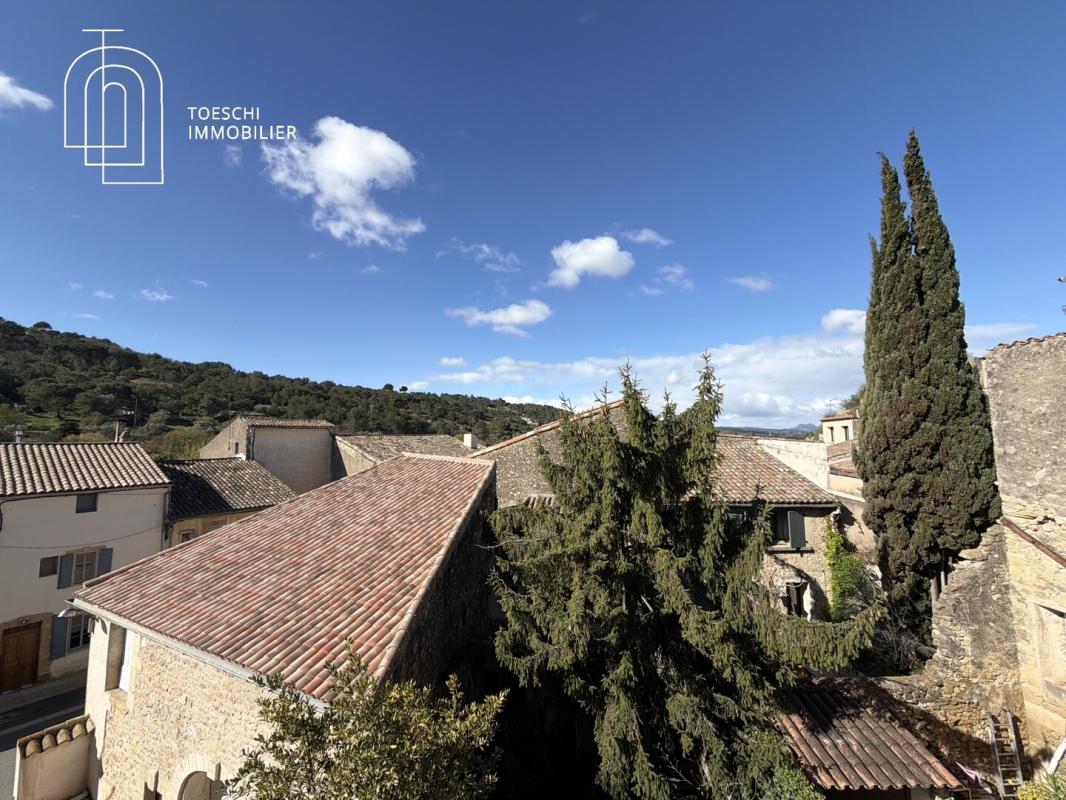 Ensemble immobilier avec dépendance et jardin – Centre village