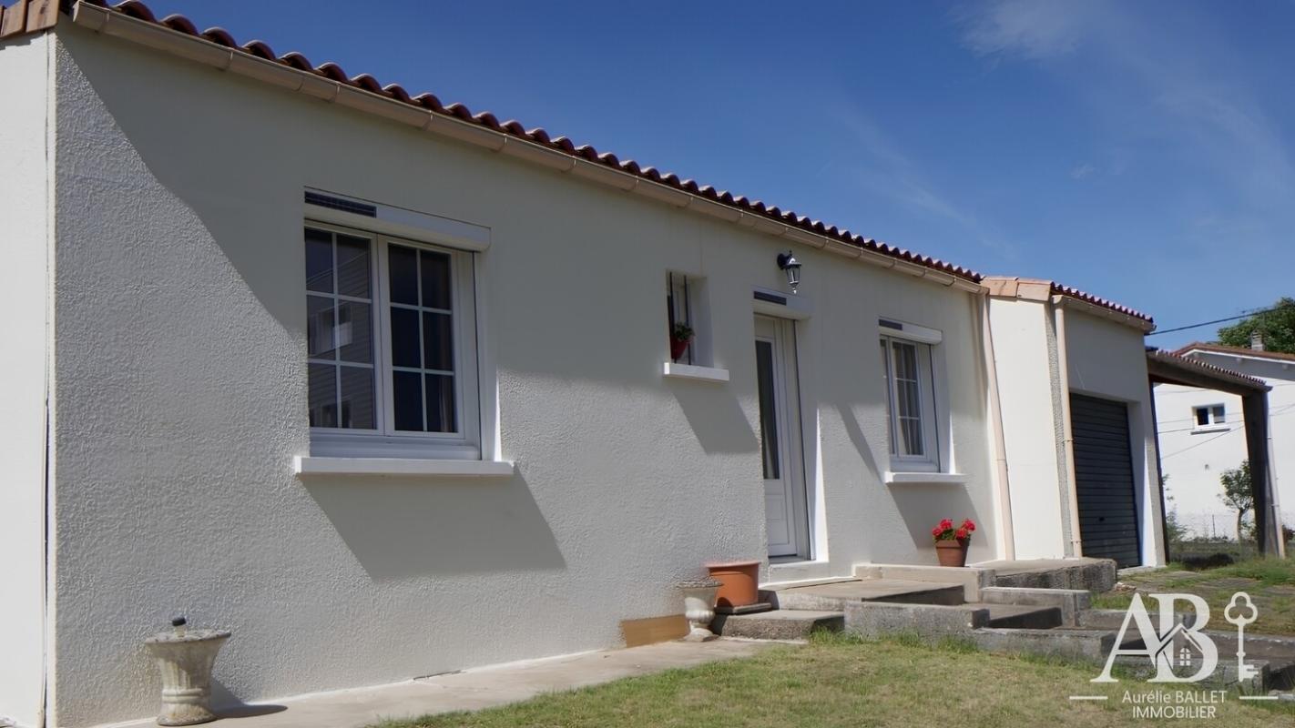 Maison + garage + auvent