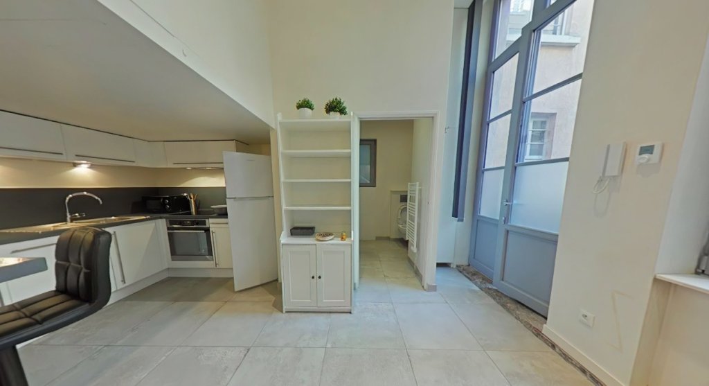 T2 AVEC MEZZANINE // RUE BOUTEILLE 69001 LYON - Photo 2