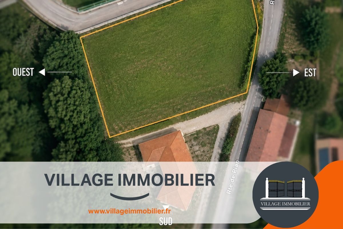 Terrain constructible de 1 500 m² au cœur du village de Crachier