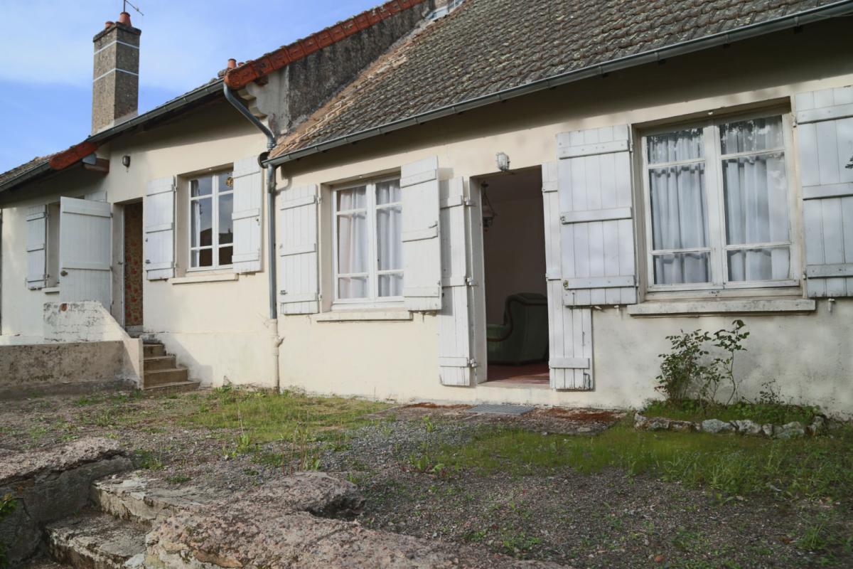 Maisons d'habitation composée de deux anciens logements à proximité du lac