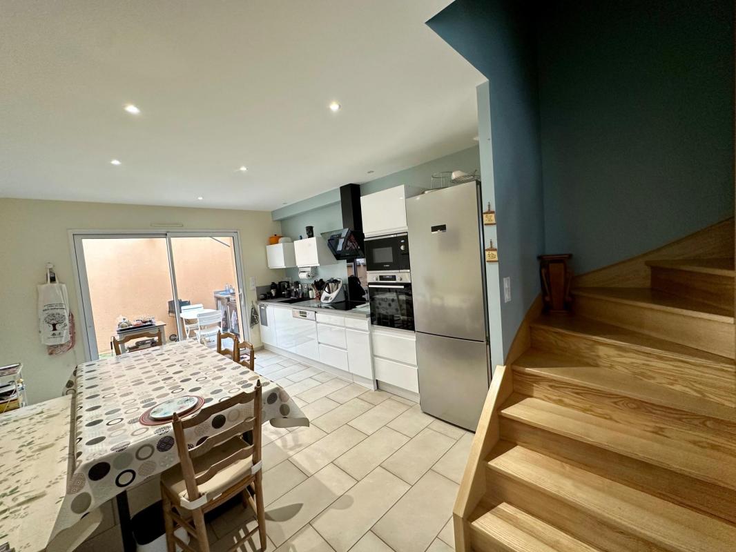 Maison de plain pied avec garage - Photo 3