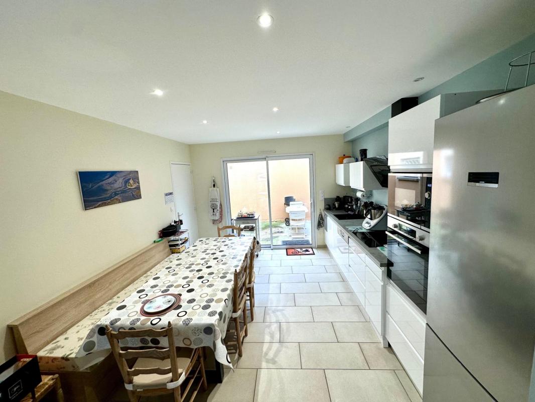 Maison de plain pied avec garage - Photo 4