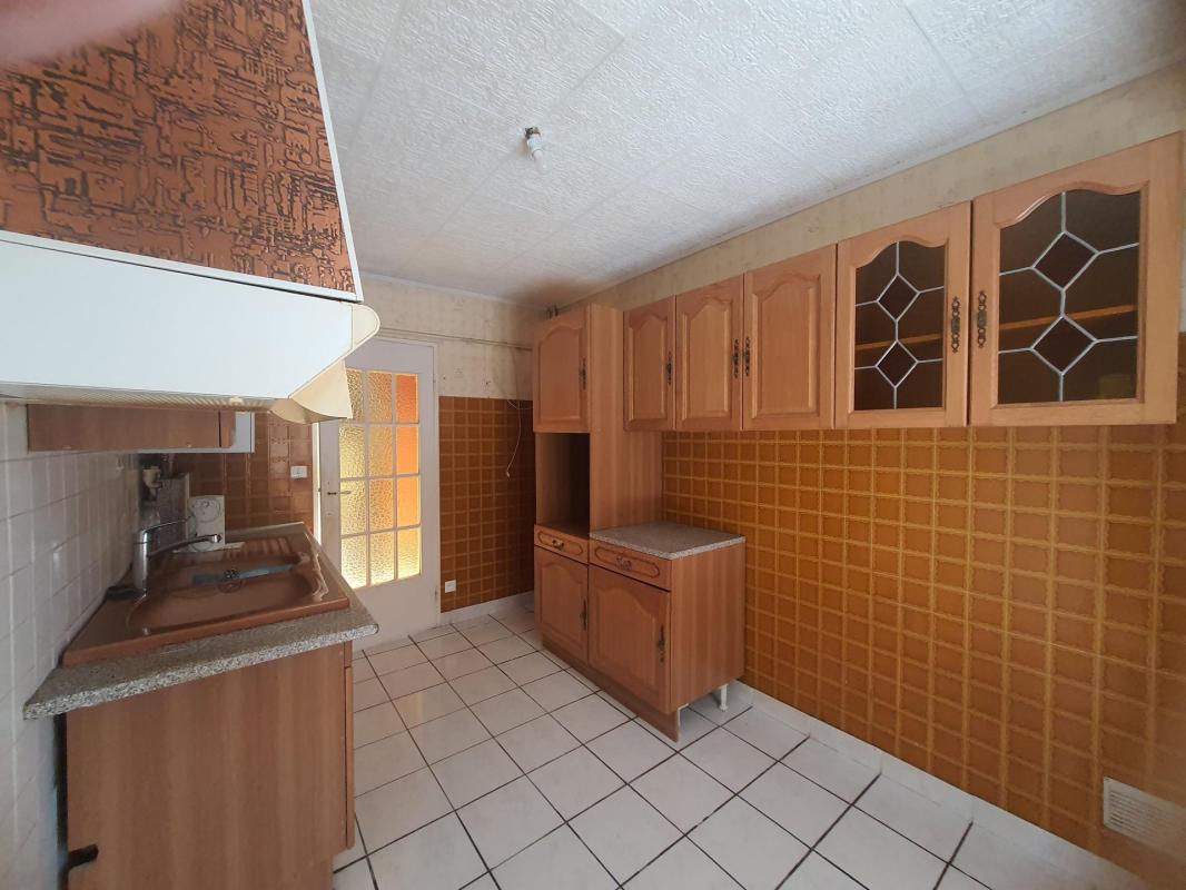 Pavillon sur sous-sol semi-entérré dans un quartier pisé - Photo 3