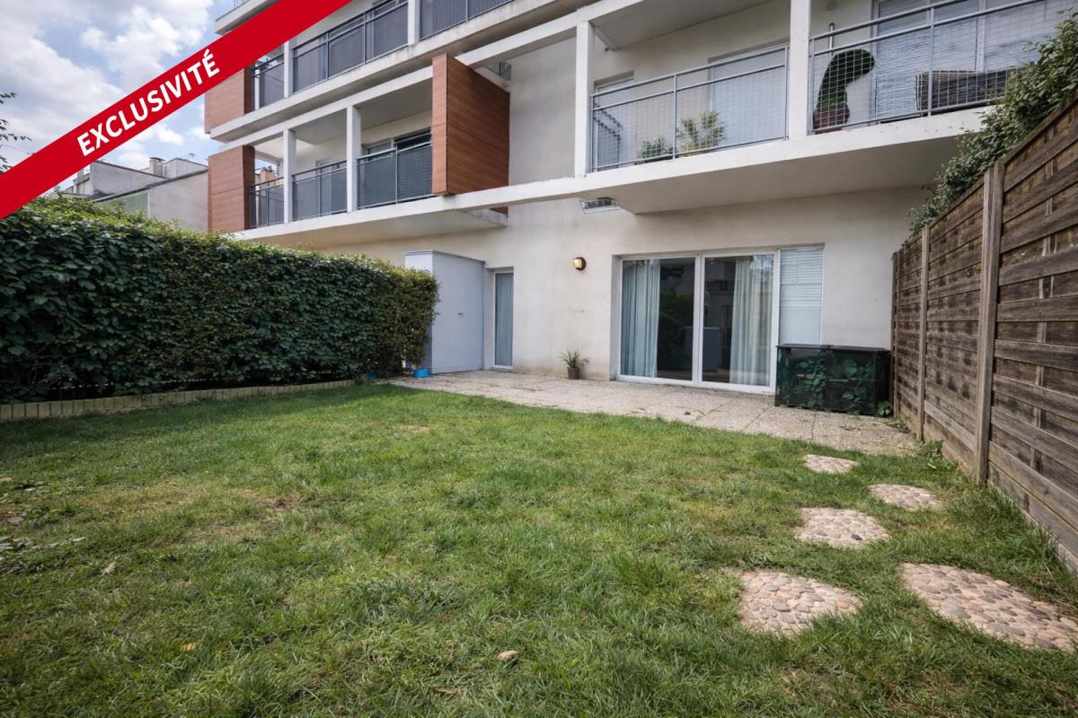 Appartement en rez de jardin - Photo 2