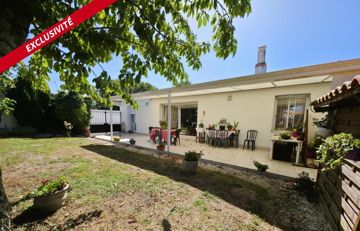 Maison de plain-pied avec jardin et grand garage - Photo 3