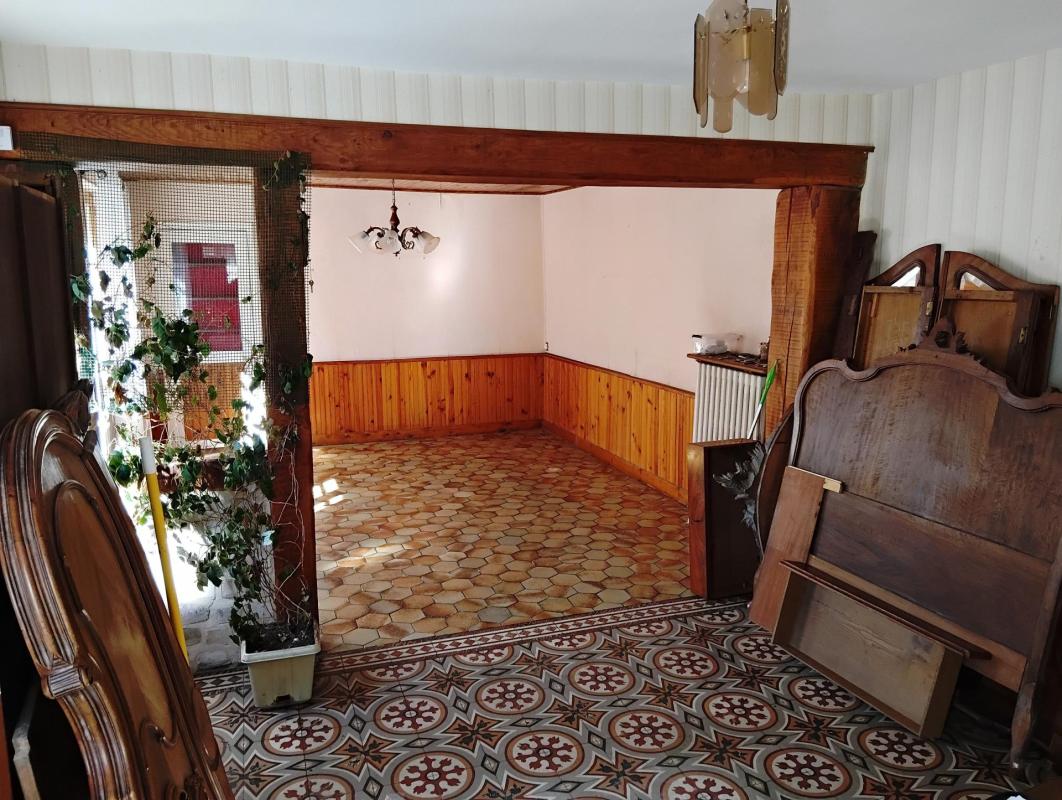 Située sur la commune de L'Aigle, cette maison offre un beau potentiel pour un projet de résidence principale ou d’investissement locatif - Photo 4