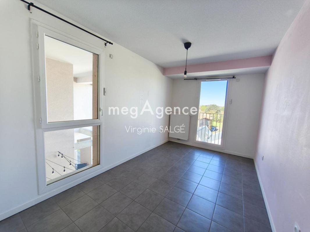 TOULOUSE - LARDENNE - APPARTEMENT DUPLEX T3 DE 85M² AVEC TERRASSE ET GARAGE BOXE - Photo 4