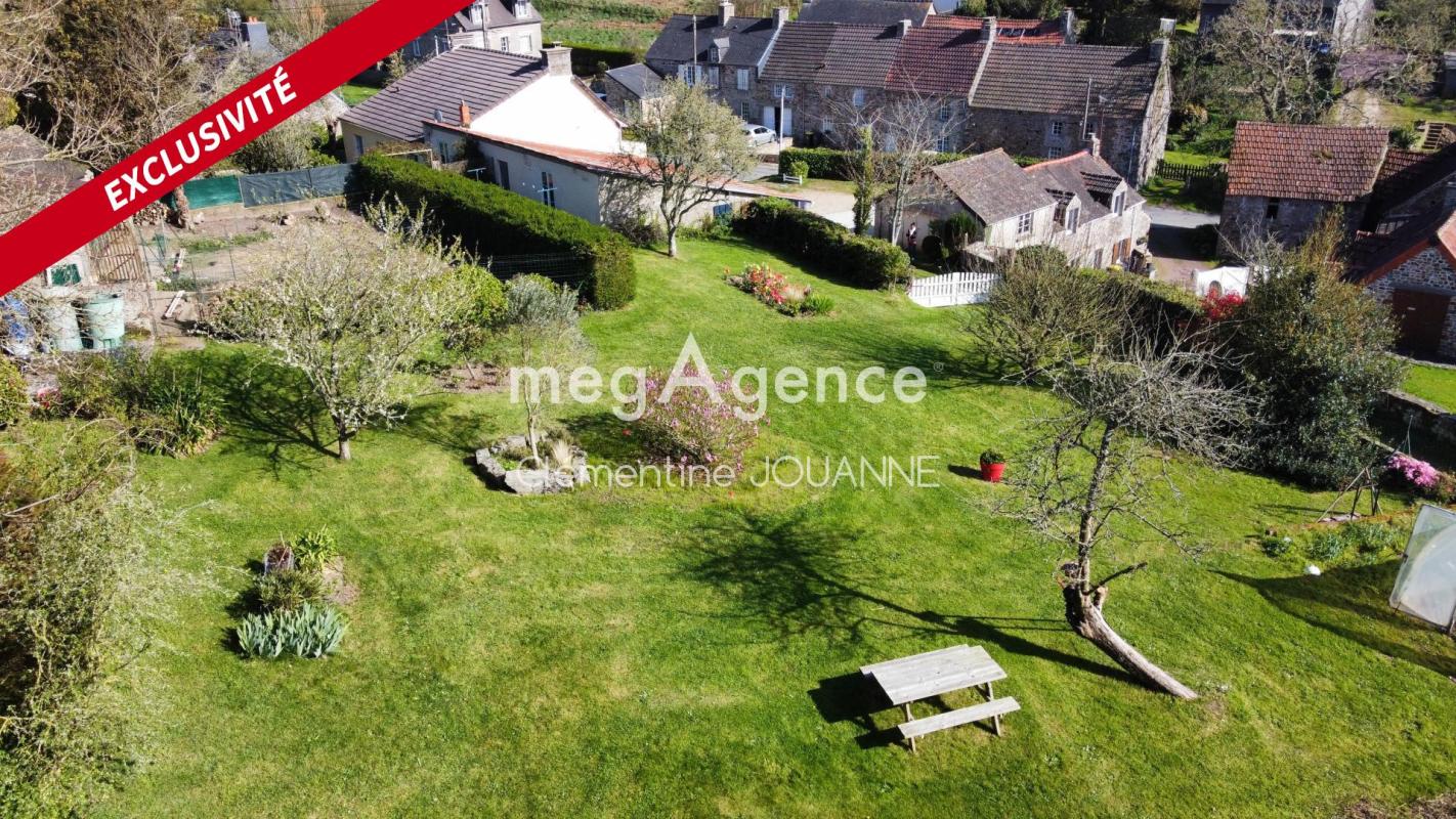 Maison en pierre avec magnifique jardin, garage et stationnement en plein cœur de la petite Siouville avec un DPE C - Photo 3