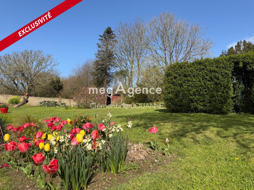 Maison en pierre avec magnifique jardin, garage et stationnement en plein cœur de la petite Siouville avec un DPE C - Photo 4