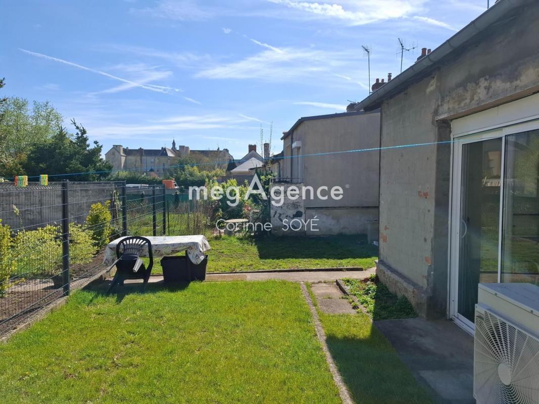 Maison lumineuse , avec jardin, stationnement, et équipement écologique - Photo 5