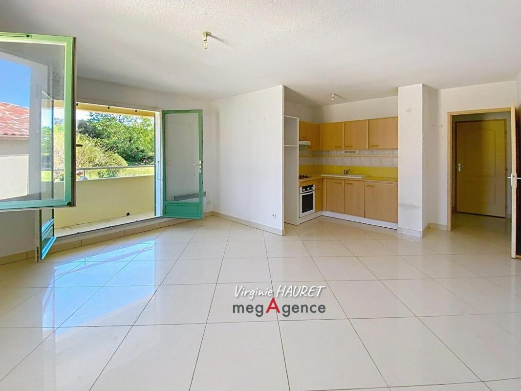 APPARTEMENT 55m² - 2 CHAMBRES - BALCON - CELLIER - GARAGE - Photo 2