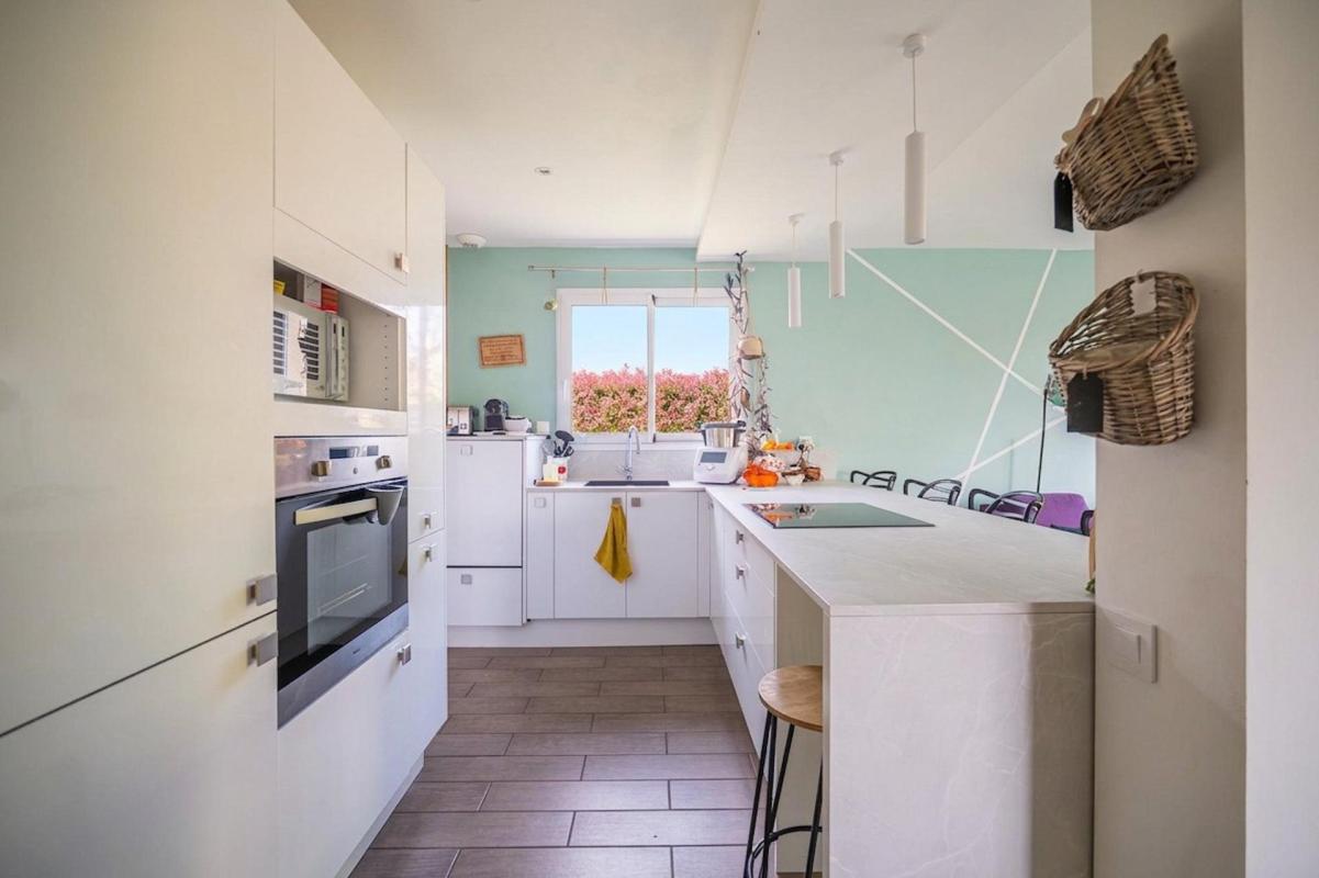 Maison familiale sur un terrain de 1000 m² - Photo 5