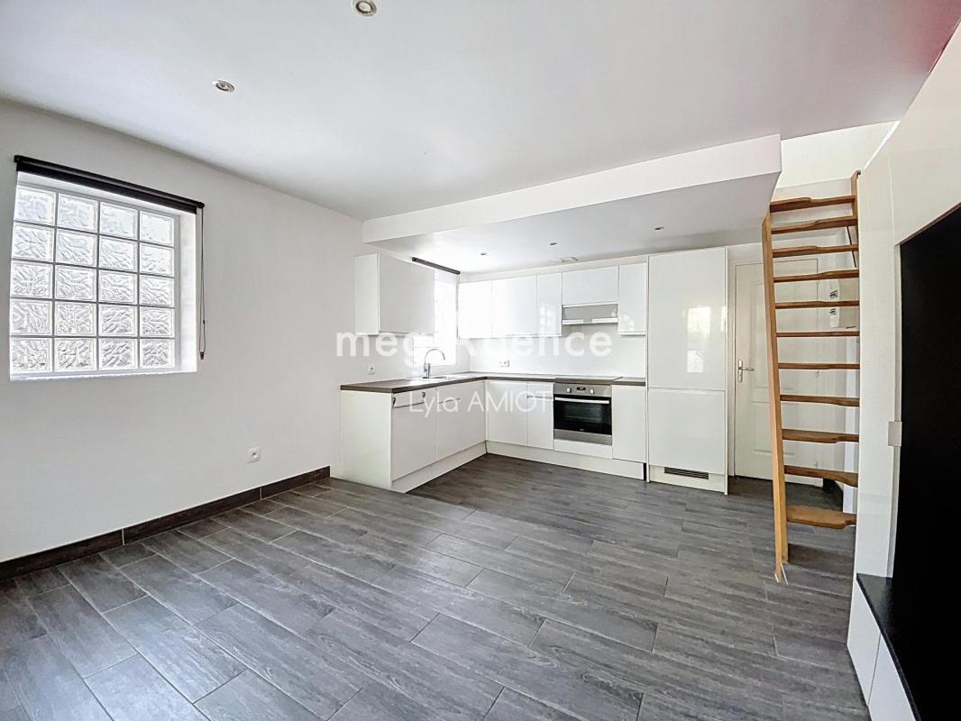 APPARTEMENT EN DUPLEX AVEC JARDIN PRIVATIF - Photo 4
